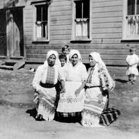 Three women in traditional Ukrainian dress