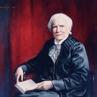 Portrait of Elizabeth Blackwell seated with an open book on her lap.