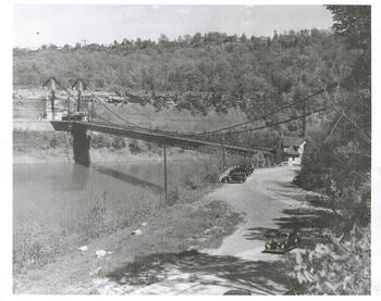 A black and white image of the suspension bridge over the Niagara Gorge in Lewiston