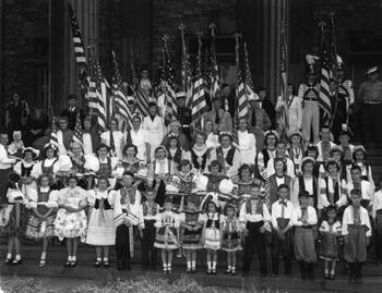 Large crowd of people in different national costumes