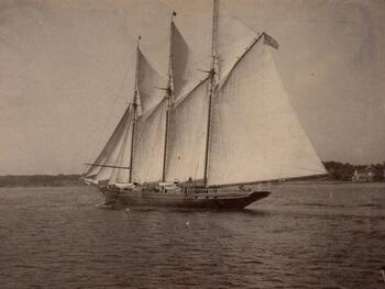 Three masted schooner under sail on Hudson River