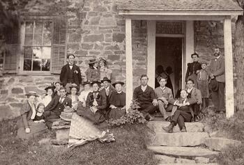 Group photo in front of Jean Hasbrouck house