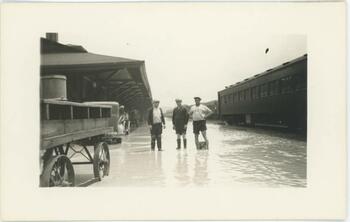 Standing near Trains, 1935