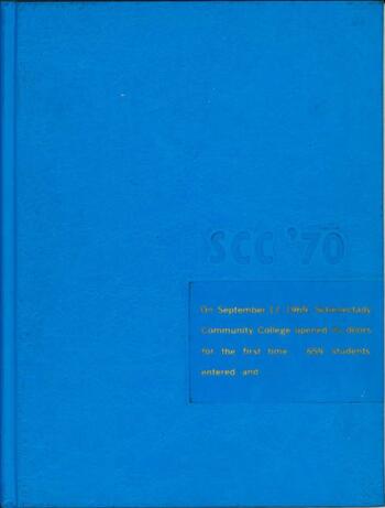Blue yearbook cover with gold print