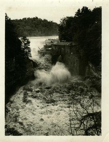 Triphammer Dam during a flood
