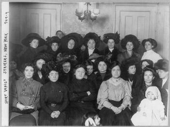 Group of mainly female shirtwaist workers on strike, in a room, New York.