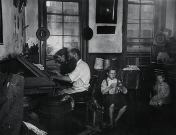 Bohemian Cigarmakers at Work in their Tenement, 1889.