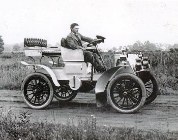 James Ward Packard driving automobile