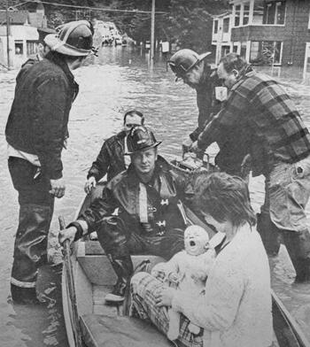 evacuating families by rowboat