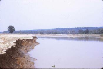 eroded land with the remaining flood water