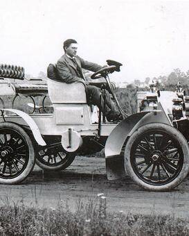 Mr Packard in his eponymous automobile